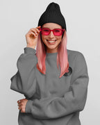Dark heather crewneck sweatshirt with embroidered record player patch on chest