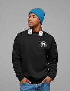 Black unisex sweatshirt with small embroidered headphone logo on the chest