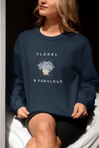 Navy sweatshirt with floral graphic and "FLORAL" and "& FABULOUS" text