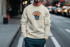 Oatmeal crewneck sweatshirt with circular planet graphic centered on the chest