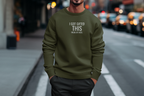 Men's dark green crewneck sweatshirt with 'I got gifted this from my kids' chest print
