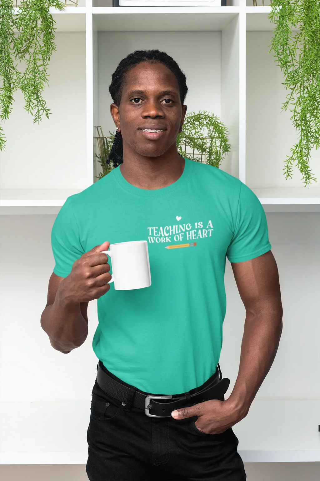 Unisex T-shirt, teal crew neck, 'Teaching is a work of heart' chest print with pencil