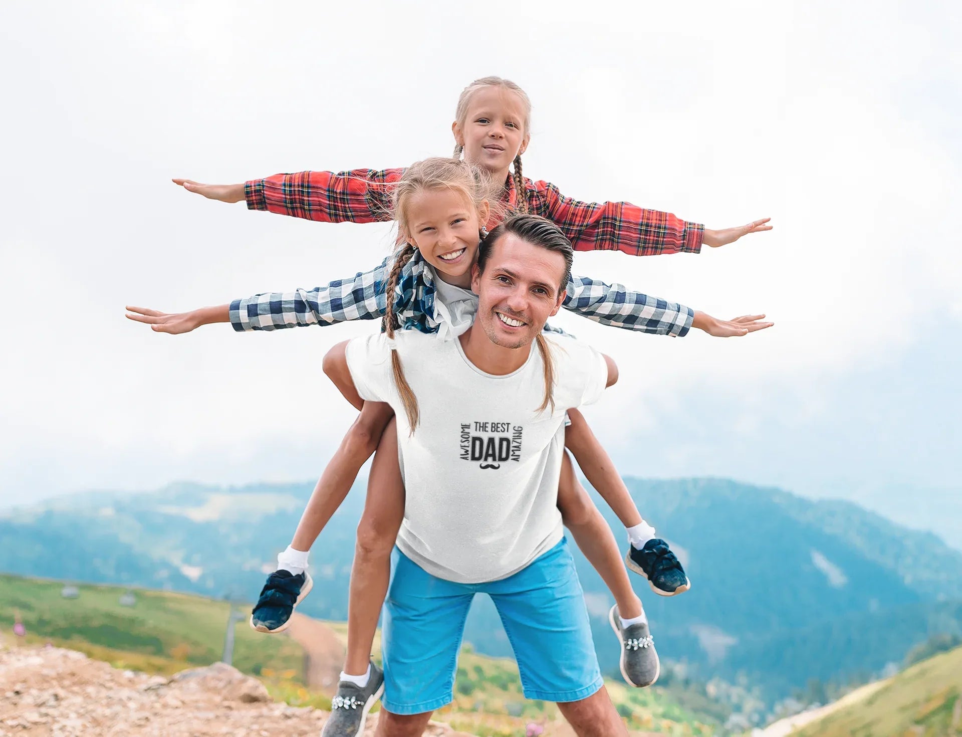 White heavy cotton T-shirt with “The Best Dad” graphic and mustache emblem on the chest.