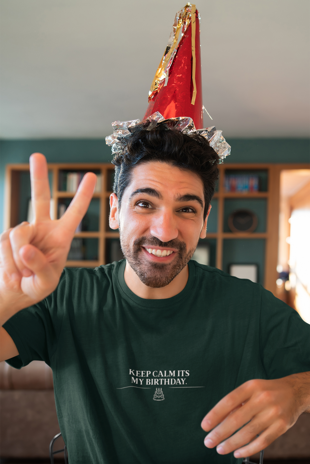 Dark green crew-neck T-shirt with front graphic text "Keep Calm Its My Birthday"
