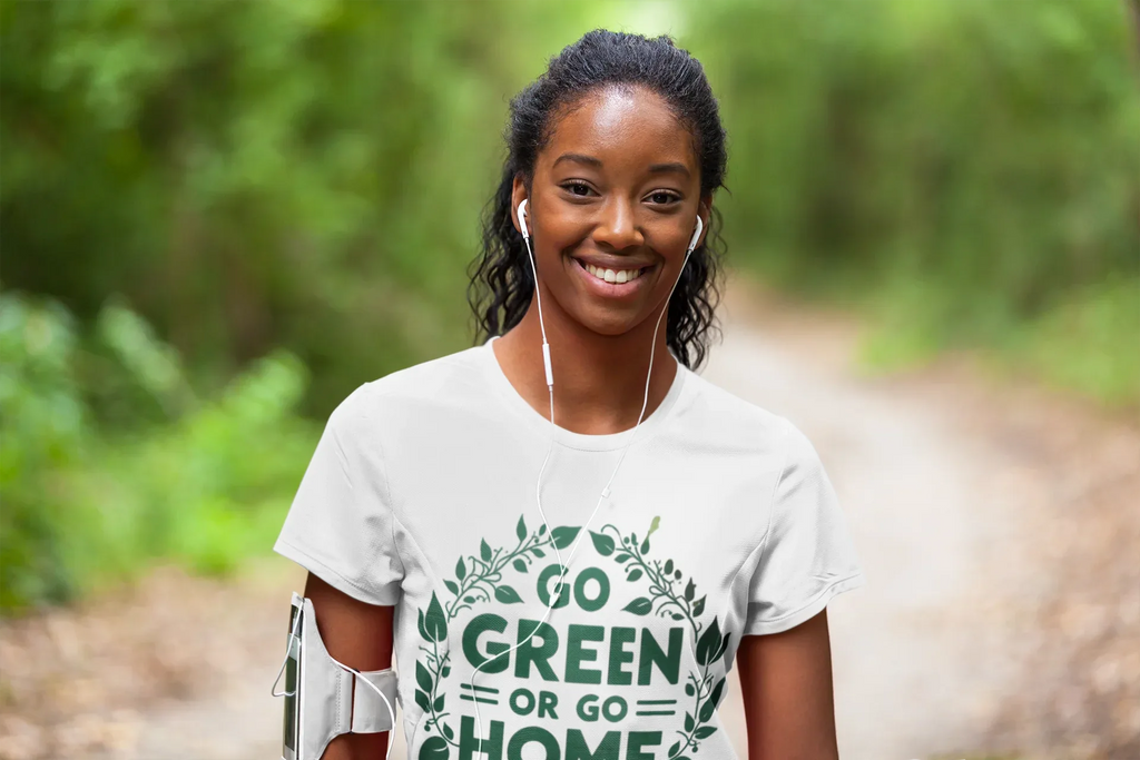 White unisex T-shirt with chest graphic print reading "GO GREEN OR GO HOME"