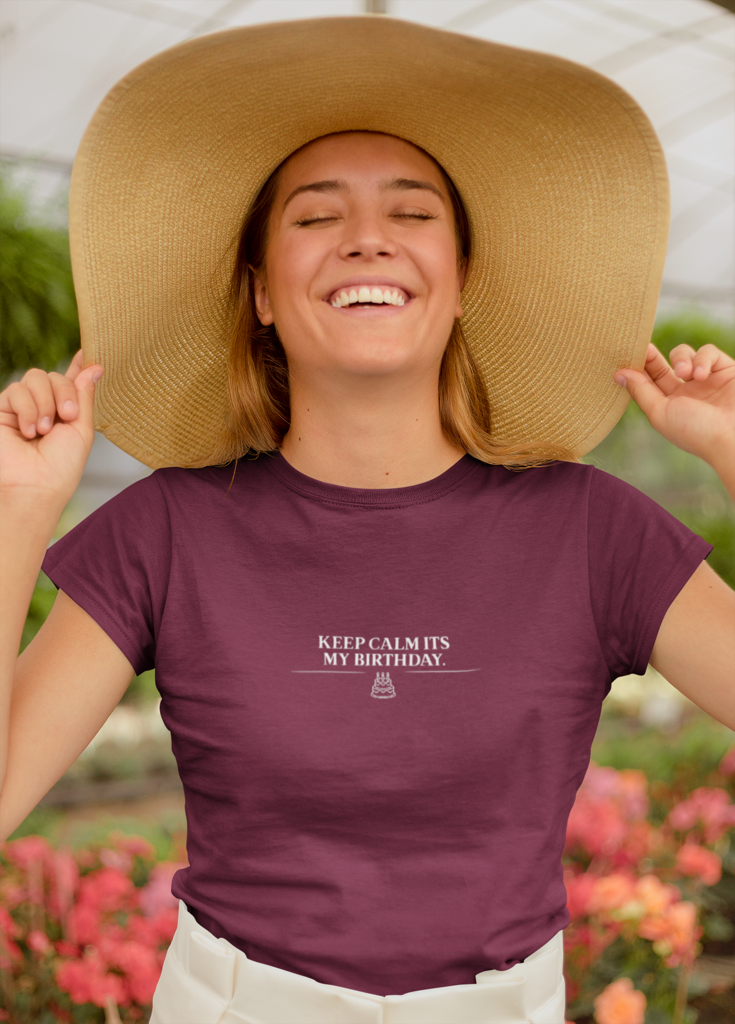 Maroon T-shirt on a person with small chest text: “KEEP CALM IT’S MY BIRTHDAY”.