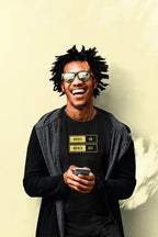 Black unisex T-shirt with “Music On / World Off” chest graphic