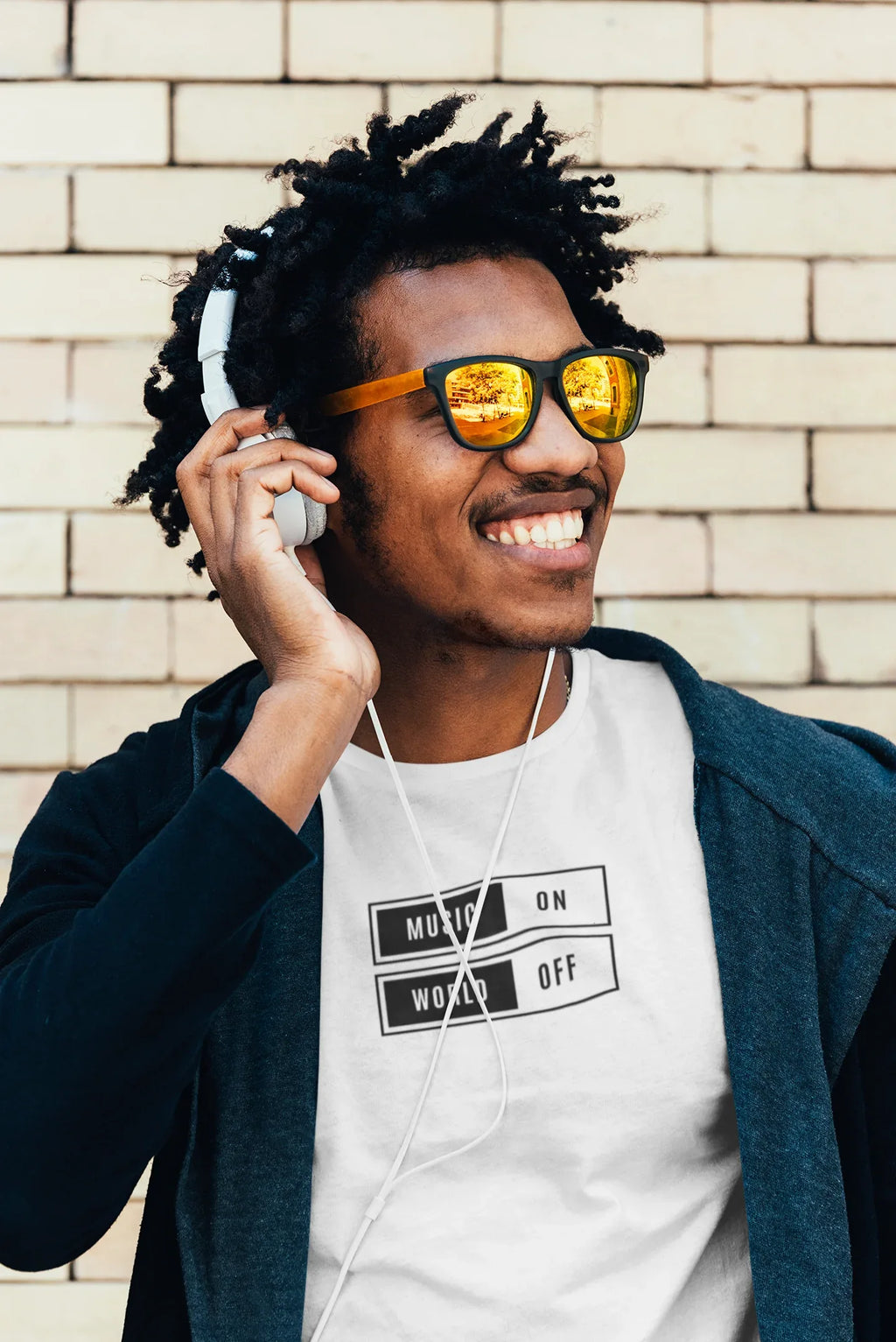 White unisex T-shirt with “Music On / World Off” square chest graphic