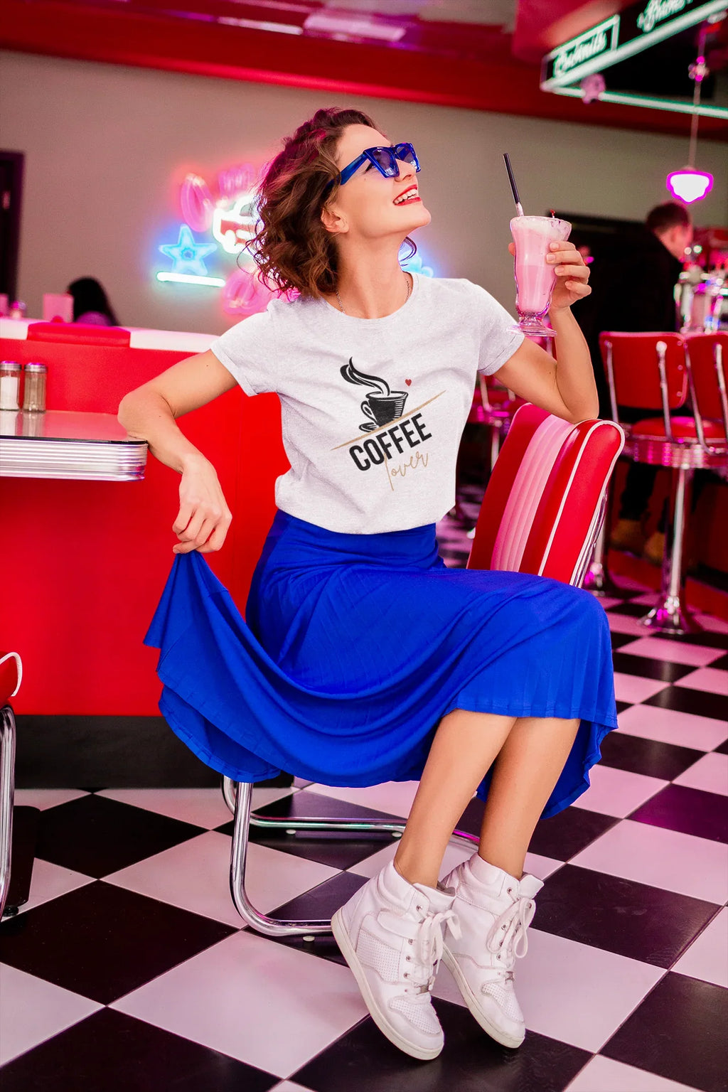 White unisex T-shirt with coffee cup graphic and “coffee” word on chest