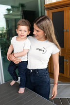 White mum T-shirt worn with jeans, short sleeves and chest logo