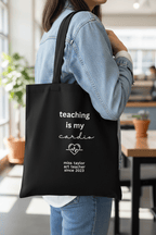 Black tote bag on person, "teaching is my cardio" with "miss taylor" since 2023