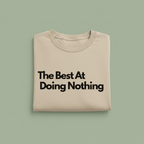 Beige T-shirt with "The Best At Doing Nothing" text print