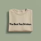Beige T-shirt with "The Best Tea Drinker" text print
