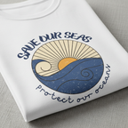 White T-shirt close-up with Save Our Seas wave logo print