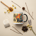 Navy ceramic mug with bear, pine trees, and flames; reads “TOO WILD FOR HERBAL TEA.”
