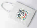 White tote bag with printed quote graphic on the front panel