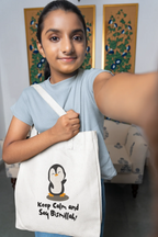White cotton tote bag with penguin graphic and slogan “Keep Calm and Say Bismillah!”