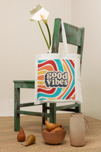 Tote bag with “good vibes” logo on the front panel