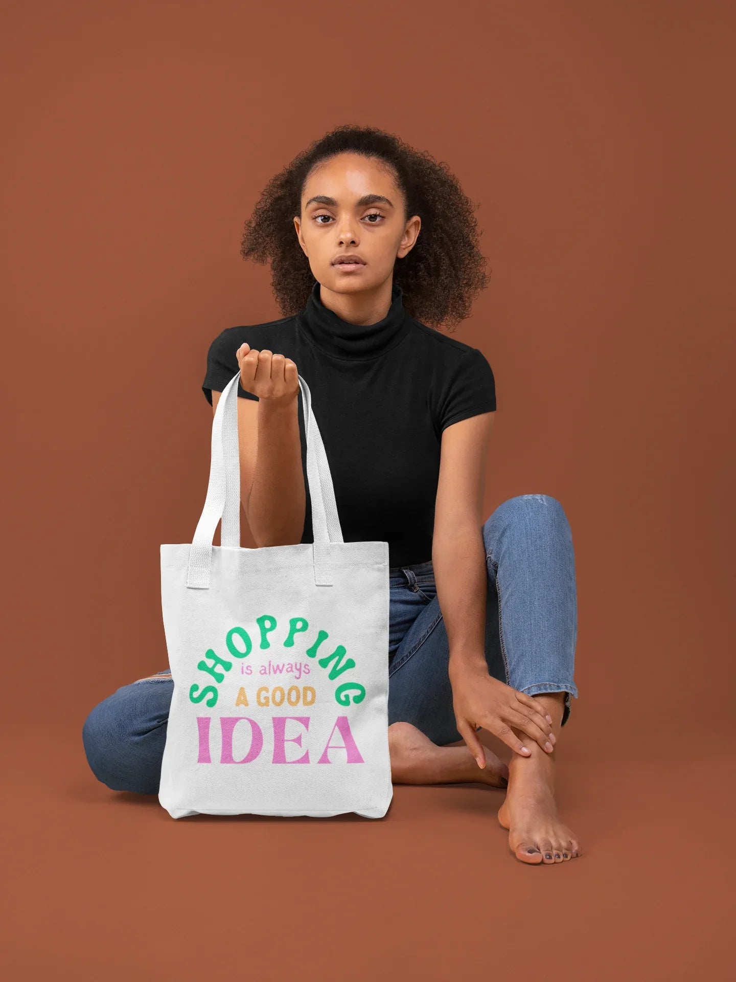 White tote bag with green "SHOPPING" and pink "IDEA" text