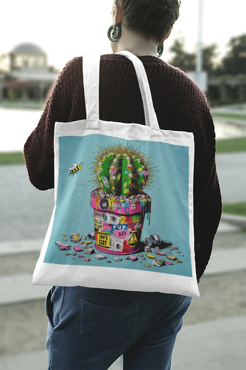 Tote bag with cactus artwork, white straps, light blue panel