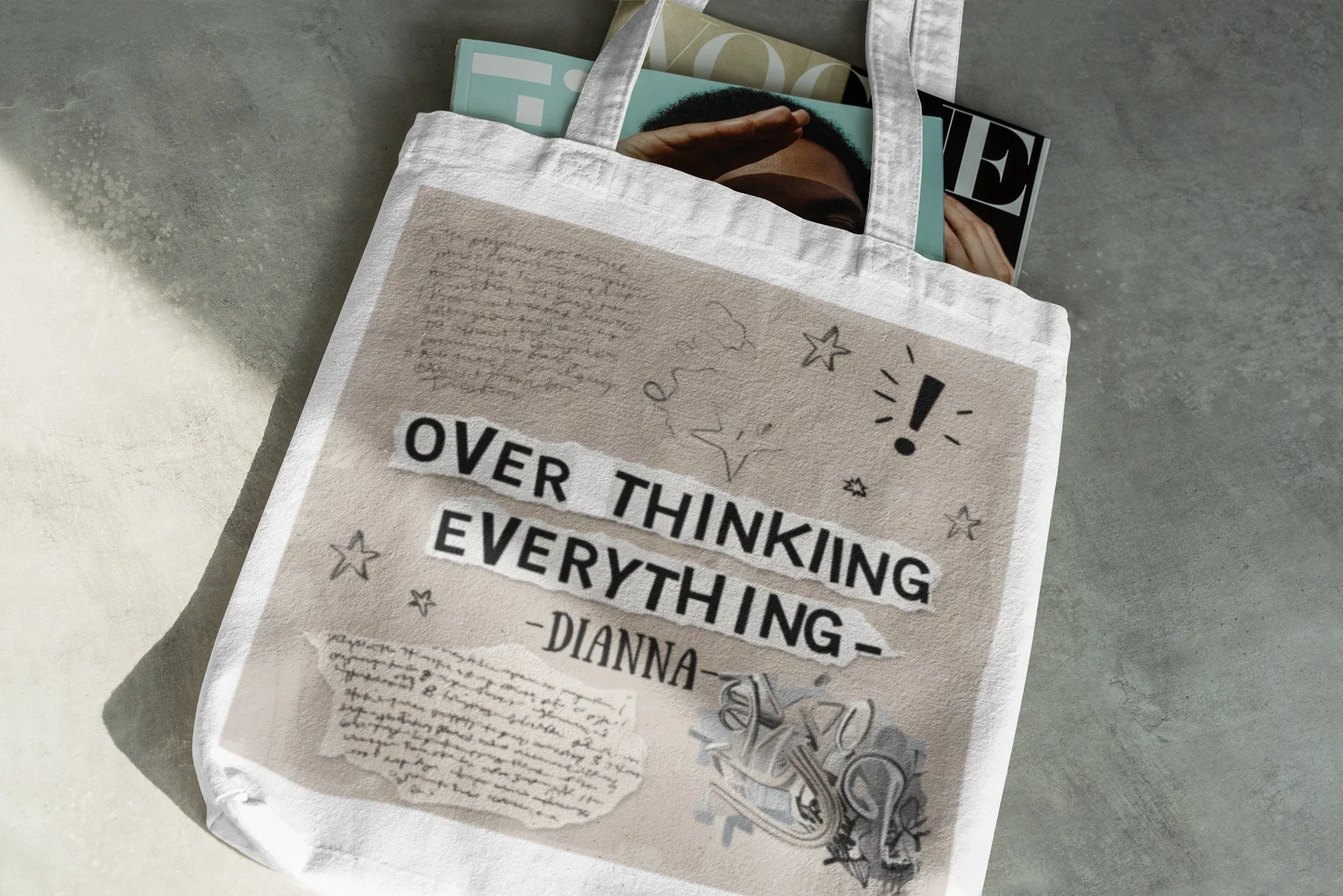 White tote bag with 'OVER THINKING EVERYTHING - Dianna' print and doodles