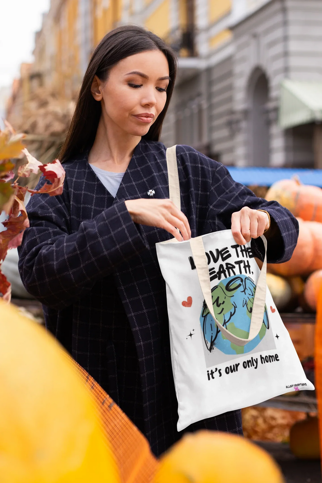 Black tote bag with Earth graphic and text Love the Earth, it’s our only home