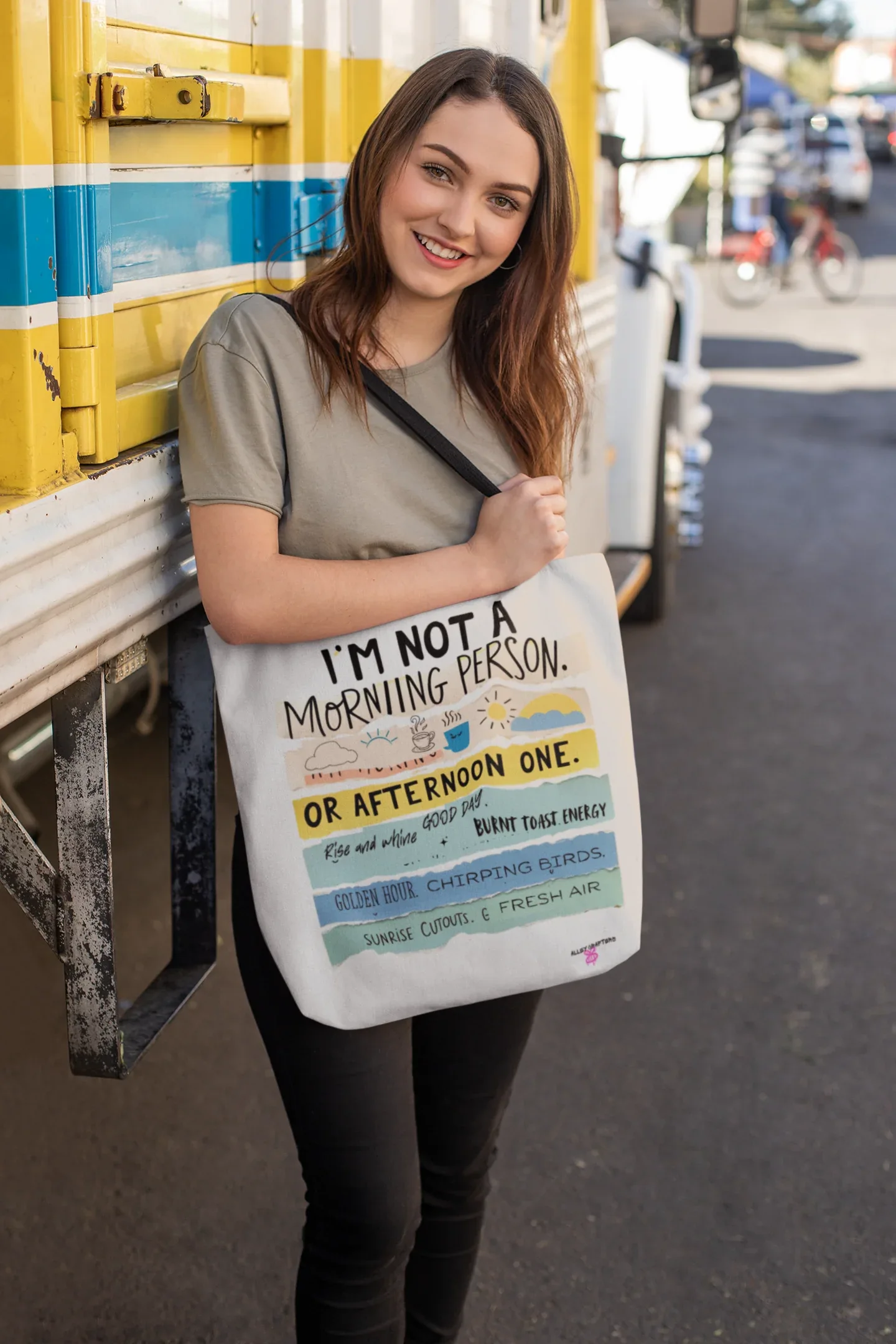 White canvas tote bag with printed text and colorful “or afternoon one” graphic