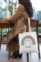 White tote bag with rainbow arch graphic and name Jenny