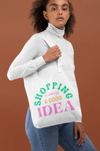 White tote bag with green and pink "SHOPPING is always a GOOD IDEA" text