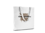 White tote bag with brown splatter and 'Have a great day' text, front view