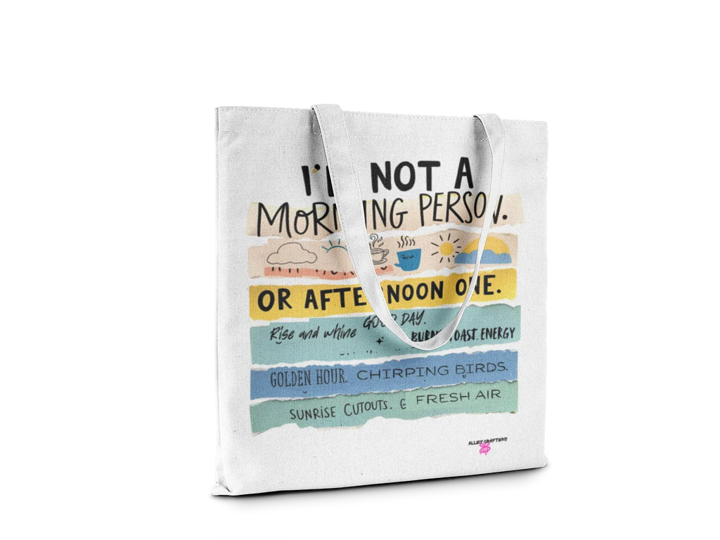 White tote bag with colorful 'or afternoon one' slogan on the front