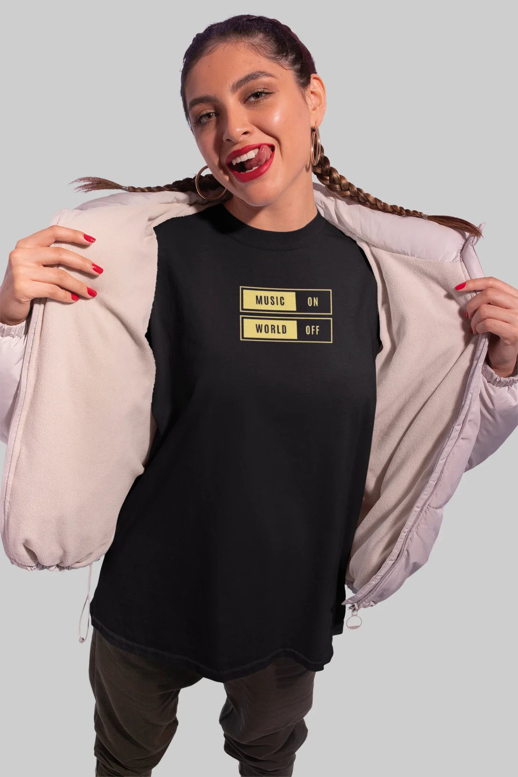 Black unisex T-shirt with “Music On / World Off” chest graphic