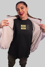 Black unisex T-shirt with “Music On / World Off” chest graphic