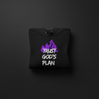 Black hoodie folded with drawstring hood and front purple “TRUST GOD’S PLAN” print.