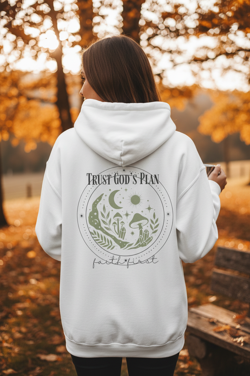 White pullover hoodie on model, back graphic with moon and “Trust God’s Plan”