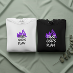 Two folded hoodies, white and black, each with purple “TRUST GOD’S PLAN” front design.