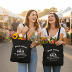Two friends at farmers market with totes