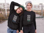 Black sweatshirt with front graphic: KEEP CALM AND ENJOY THE waves