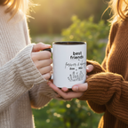 Two hands holding mug