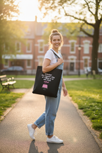 Black tote bag with birthday cake graphic and text, two fabric handles