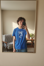 Blue crew-neck T-shirt with tropical chair graphic and text print, mirror selfie