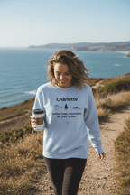 Light blue personalized crewneck sweatshirt with name Charlotte and coffee graphic
