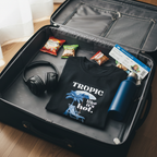 Black crew-neck T-shirt with tropical chair graphic and text print in travel case