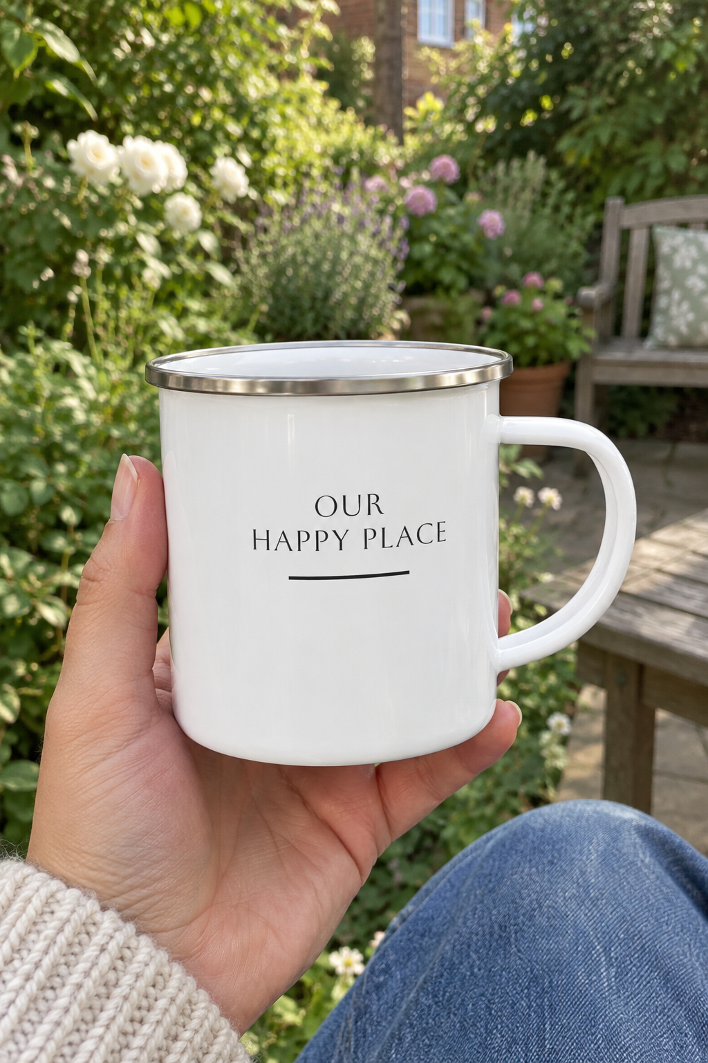 White enamel camping mug with silver rim, 'OUR HAPPY PLACE' and Lulworth Cove print