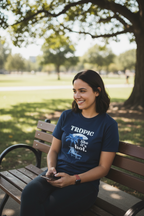 Navy T-shirt with “Tropic like it’s hot.” tropical print and palm tree graphic