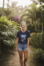 Navy crew-neck T-shirt with 'Tropic like it's hot' palm chair graphic on model