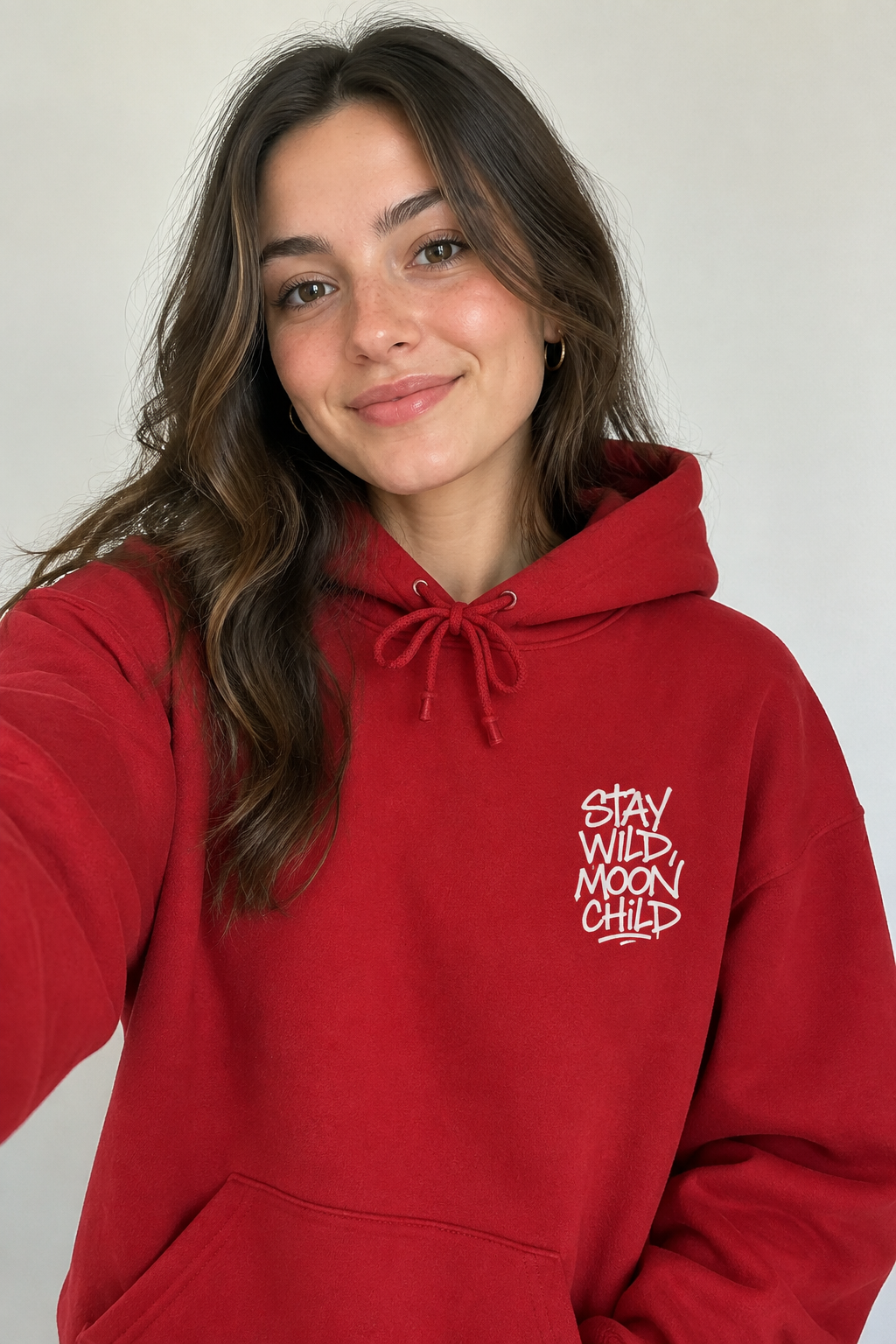 Cherry red minimal graphic hoodie with drawstring hood, front pocket, white 'Stay Wild Moon Child' print