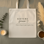 White cotton tote bag with “SISTERS forever” graphic and small name lines