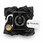 Black mug with 'Teach Love Inspire' print, with gift wrap and thank-you tag