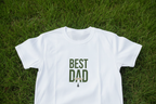 White dad T-shirt with green 'Best Dad' typography on chest